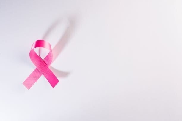 pink-ribbon-cancer-sign-on-white