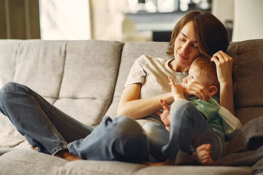 Family stay at home. Mother with little son. Coronavirus theme.